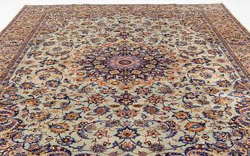 A Keshan carpet, c. 393 x 290 cm.