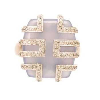 An 18K white gold ring with brilliant cut diamonds and possibly chalcedony.