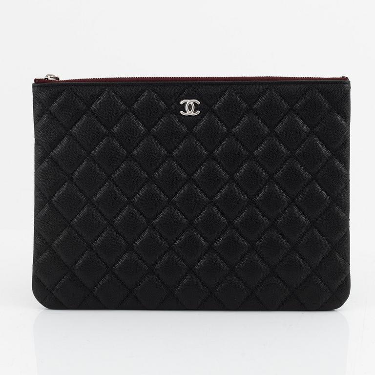 Chanel, a black caviar leather clutch, 2020.