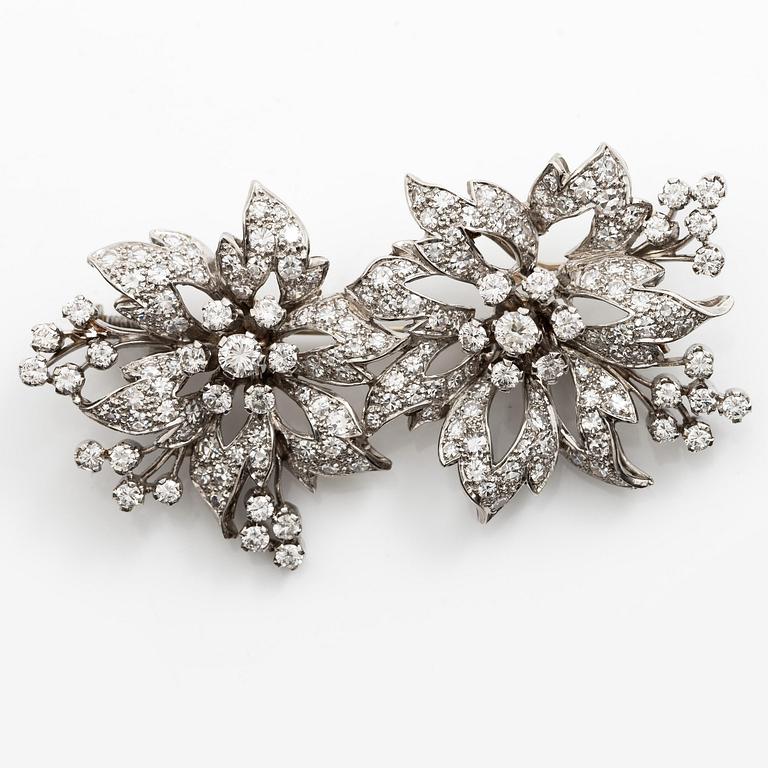 Brosch platina med runda briljant- och åttkantslipade diamanter.