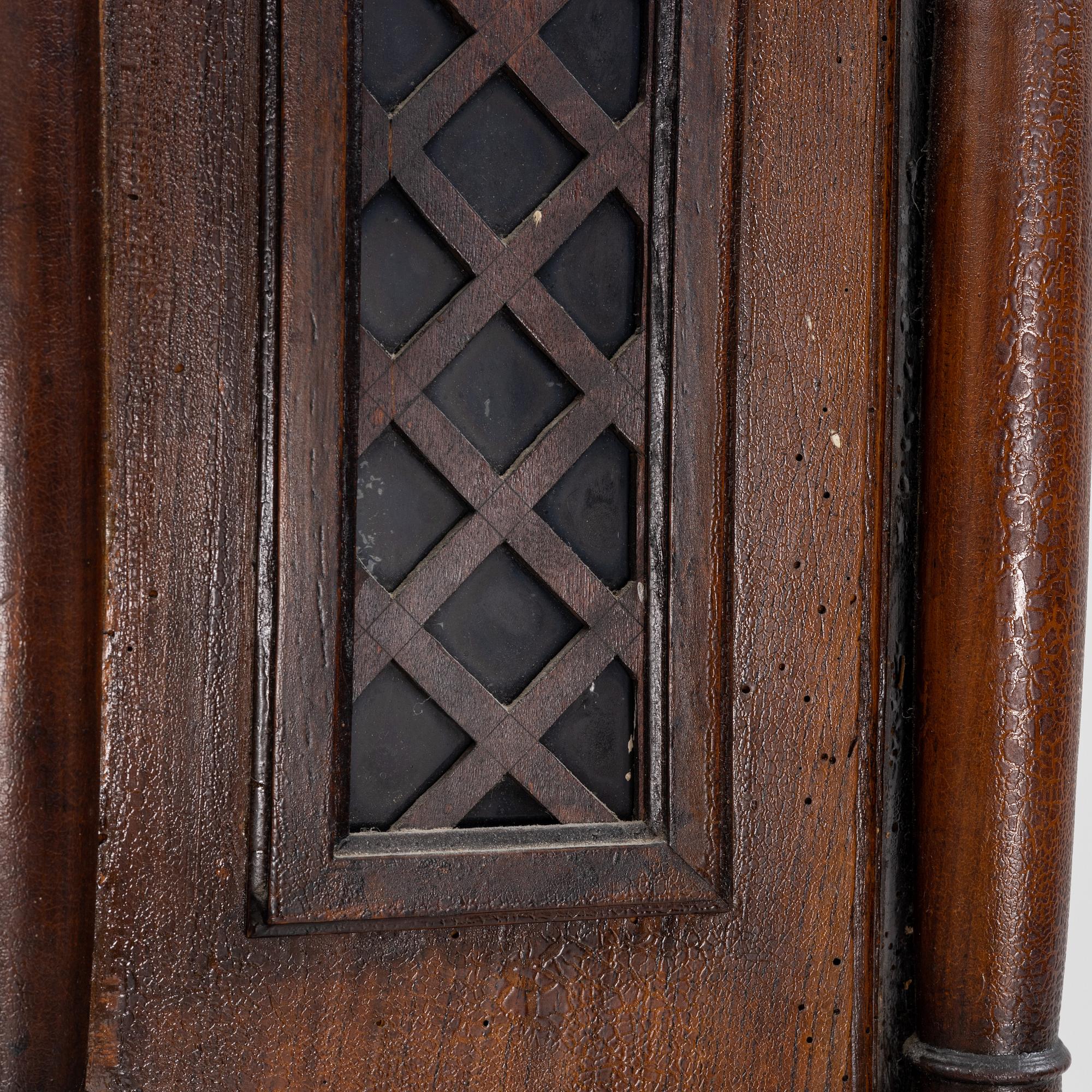 An oak longcase clock, 19th Century.