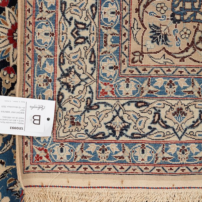 A rug, semi-antique Nain, part silk, ca 122,5 x 80 cm (as well as 1,5 cm flat weave at the ends).