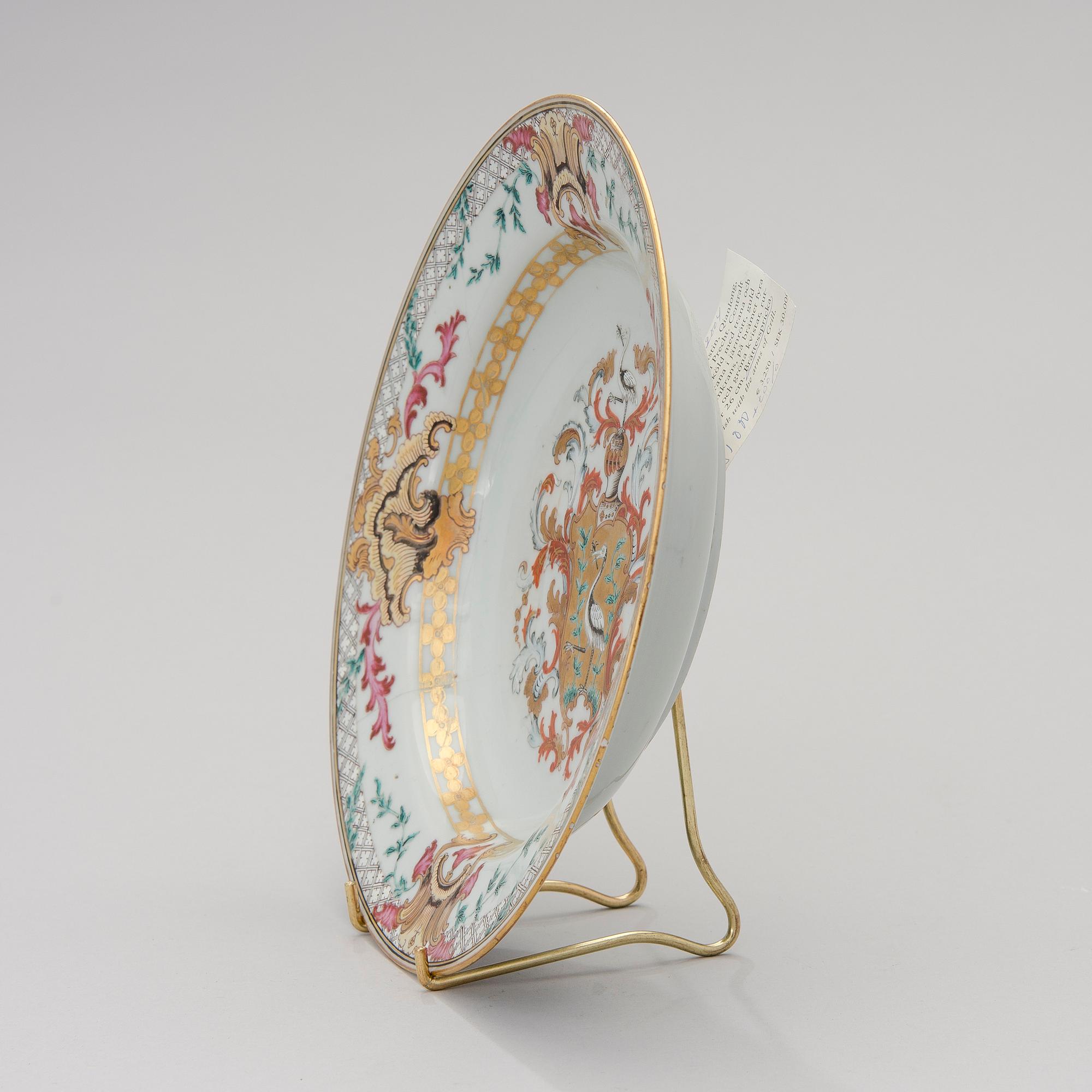 A CHINESE SOUP PLATE, amorial procelain. Qing dynasty, Qianlong (1736-95).