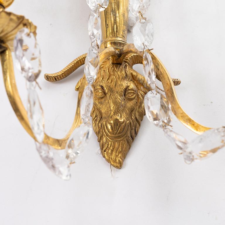 A pair of late Gustavian ormolu two-branch lustres, circa 1800.