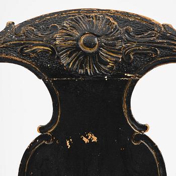 A pair of rococo armchairs in the manner of C. M. Sandberg, later part 18th century.