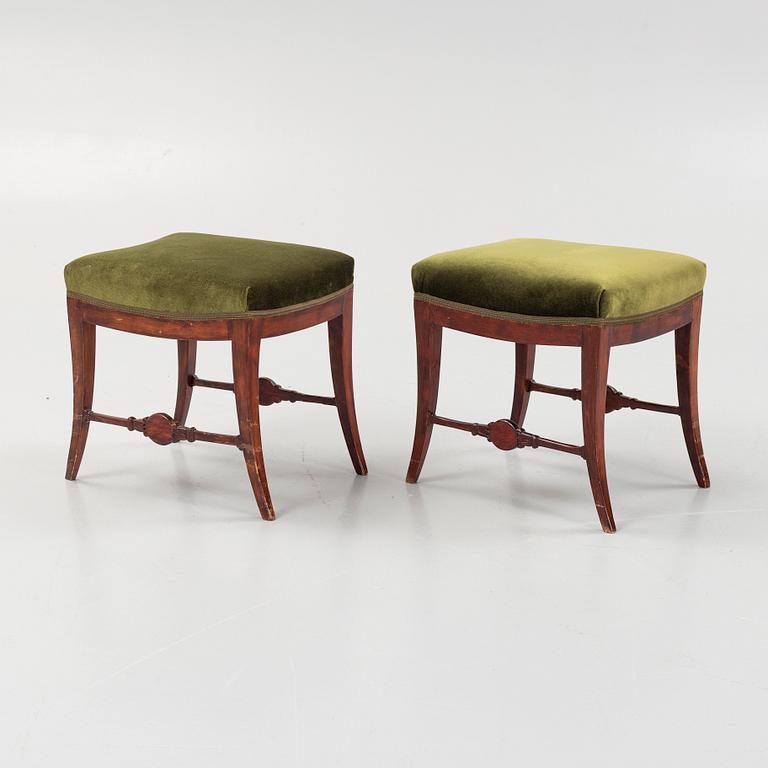 A pair of Swedish Empire stools, early 19th century.