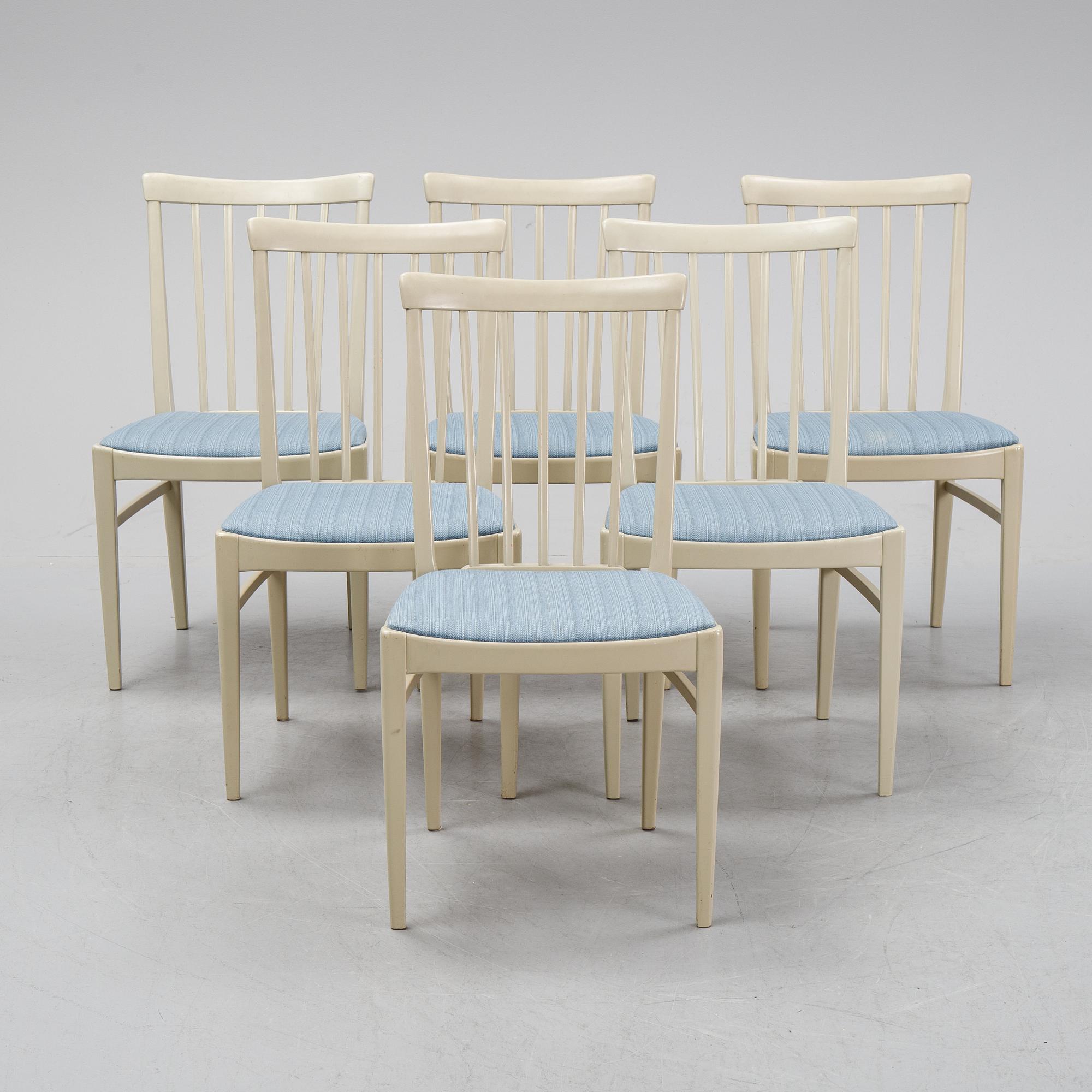 A dining table with six chairs by Carl Malmsten, second half of the 20th Century.