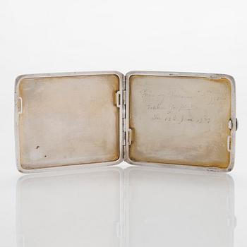 A silver cigarette case, gift from Prince and Princess Viggo, maker's mark of S. Christian Fogh, Copenhagen 1937.