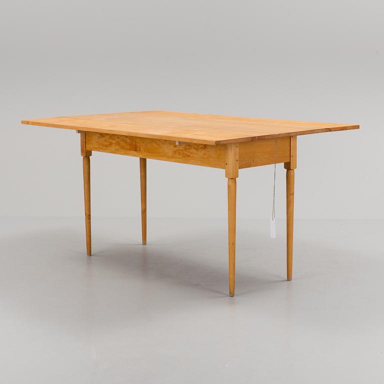 A birtch tree Shaker flap table.