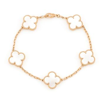 551. An 18K gold and mother-of-pearl Van Cleef & Arpels "Alhambra" bracelet.