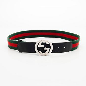 Gucci, A 'Verbier' scarf and a belt.