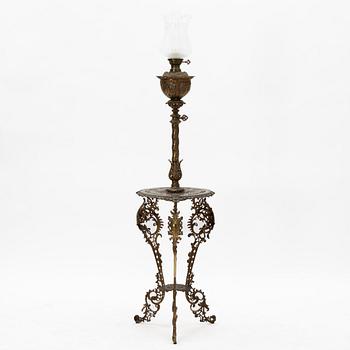 Floor oil lamp with table, late 19th century.