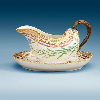 883. A Royal Copenhagen 'Flora Danica' sauceboat, Denmark, 20th Century.