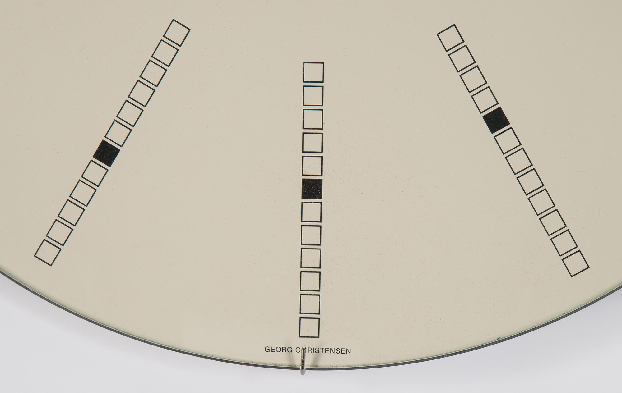 Arne Jacobsen, an aluminium quartz 'Bankers' wall clock by Georg Christensen, designed in 1971.