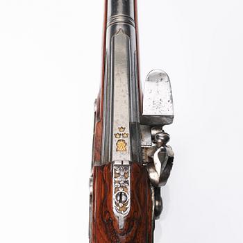 A flintlock pistol signed by Anders Wåhlberg Stockholm, (1720-93).