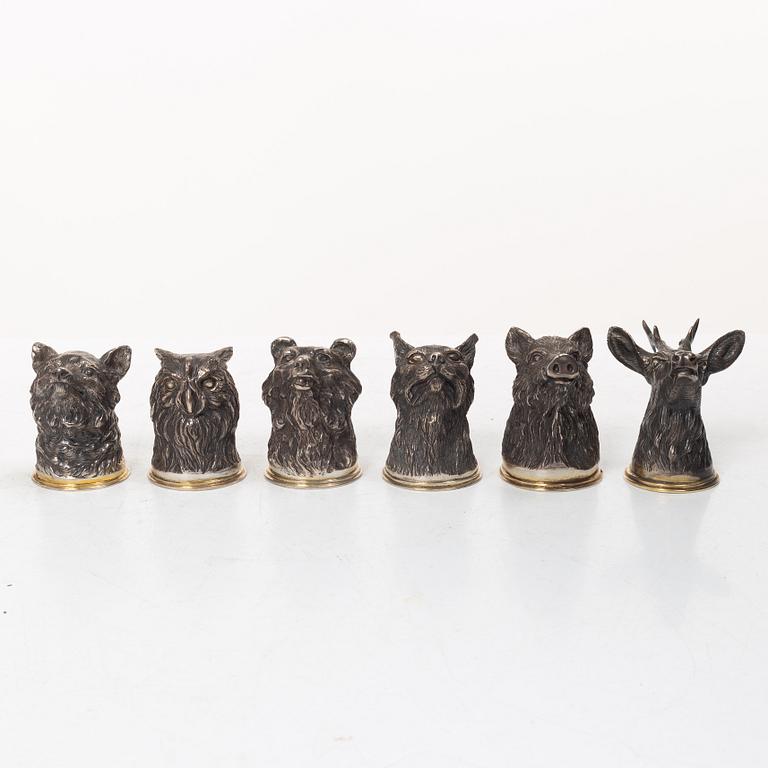 Six Russian parcel-gilt silver animal's head stirrup cups, including with mark of Nikols & Plinke, St. Petersburg.
