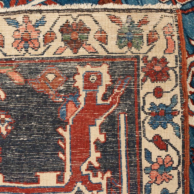 A CARPET, an antique Bakshaish, ca 693 x 398,5 cm, dated "1298"AH/1880 AD probably.