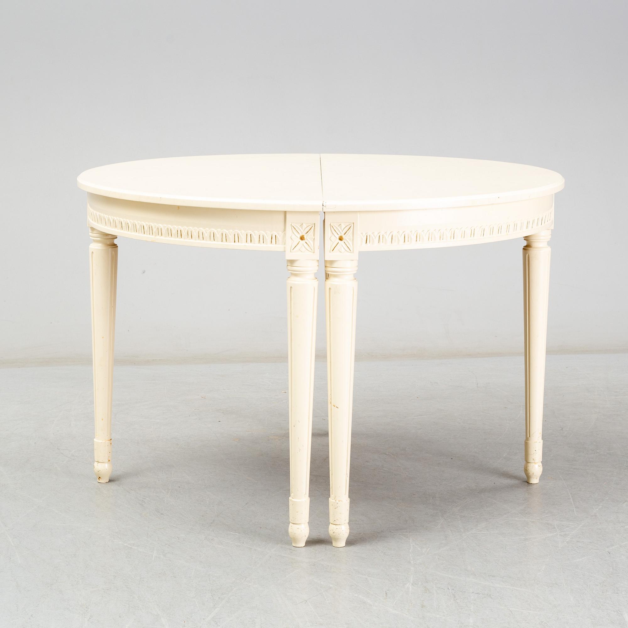 A Gustavian style dining table, second half of the 20th century. 3 leaves included.
