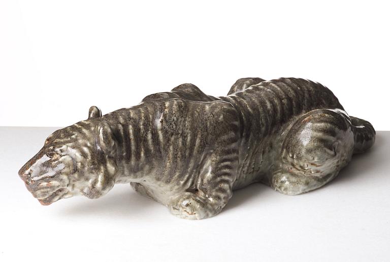 Michael Schilkin, a large stoneware sculpture of a hunting tiger, Arabia, Finland 1940's.