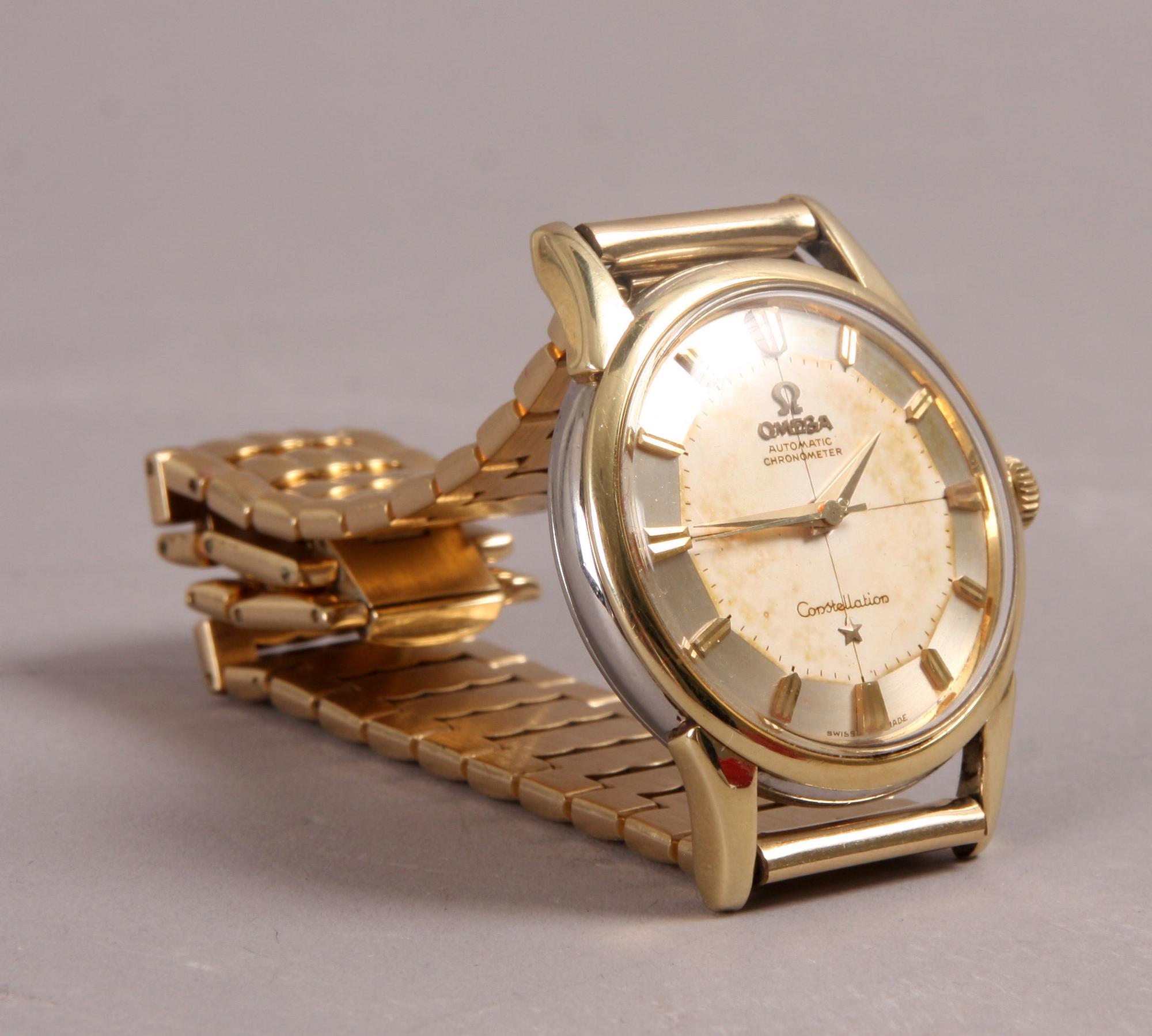 ARMBANDSUR, Omega Constellation, guld på stål.