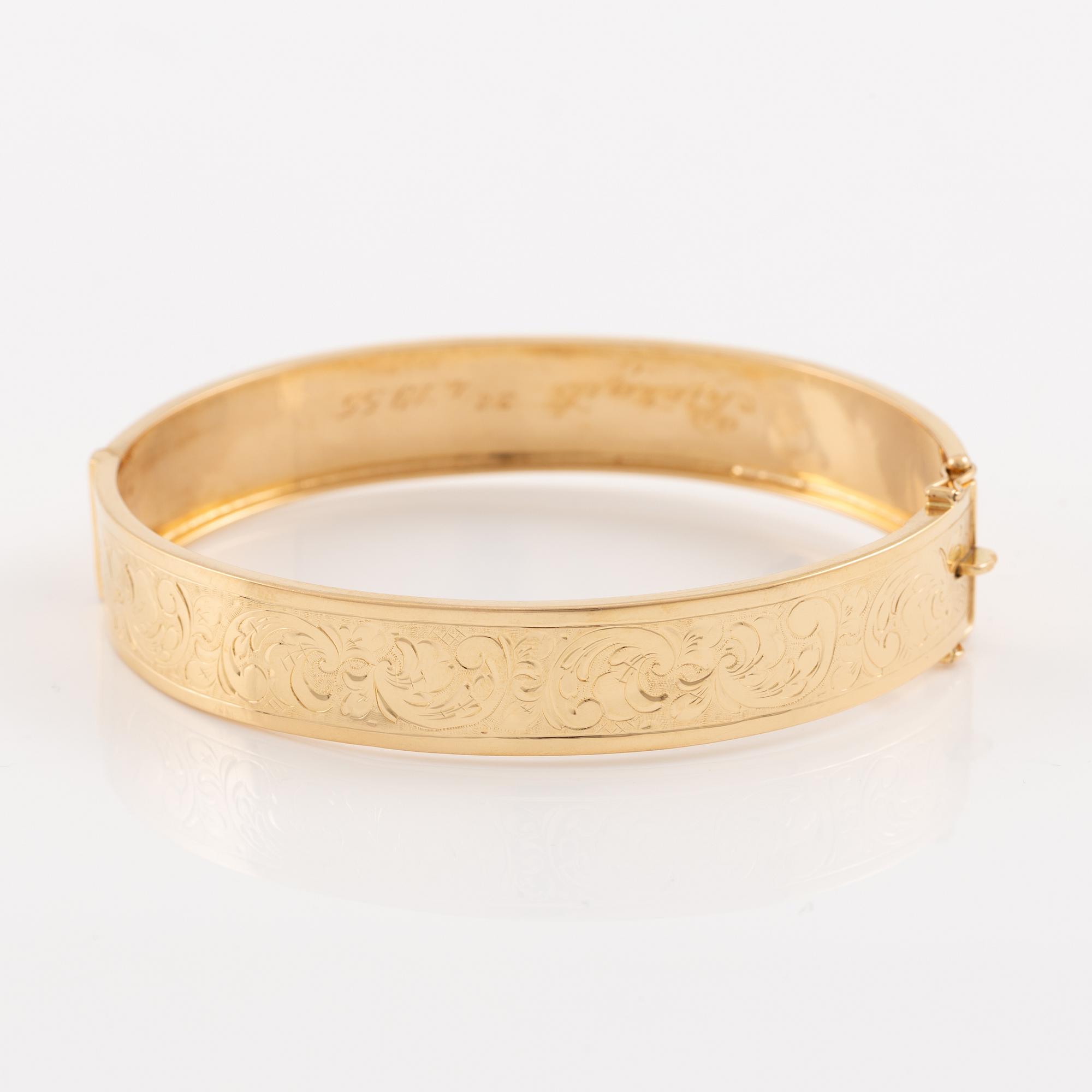 Arm ring 18K gold.