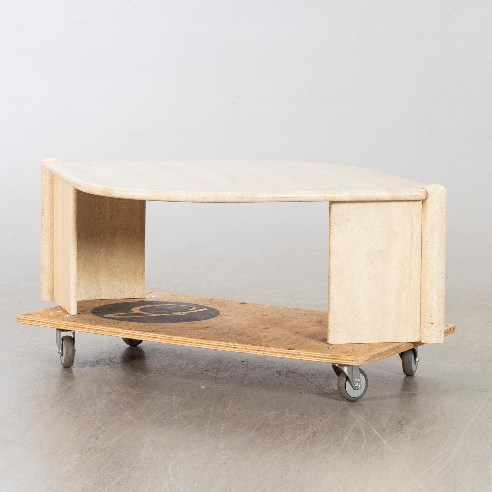 A 20th century second half travertin sofa table.