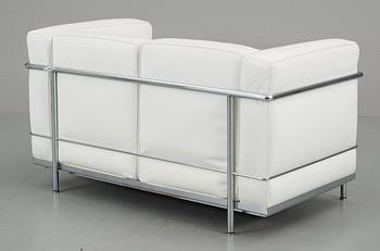 A Le Corbusier, 'LC2' chromed steel and white leather sofa by Cassina, Italy.