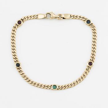 Bracelet, 14K gold with rubies, sapphires, and emerald.