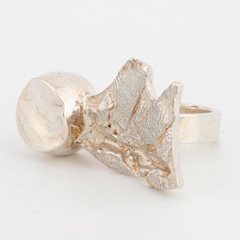 A sterling silver ring by Rolf Karlsson.