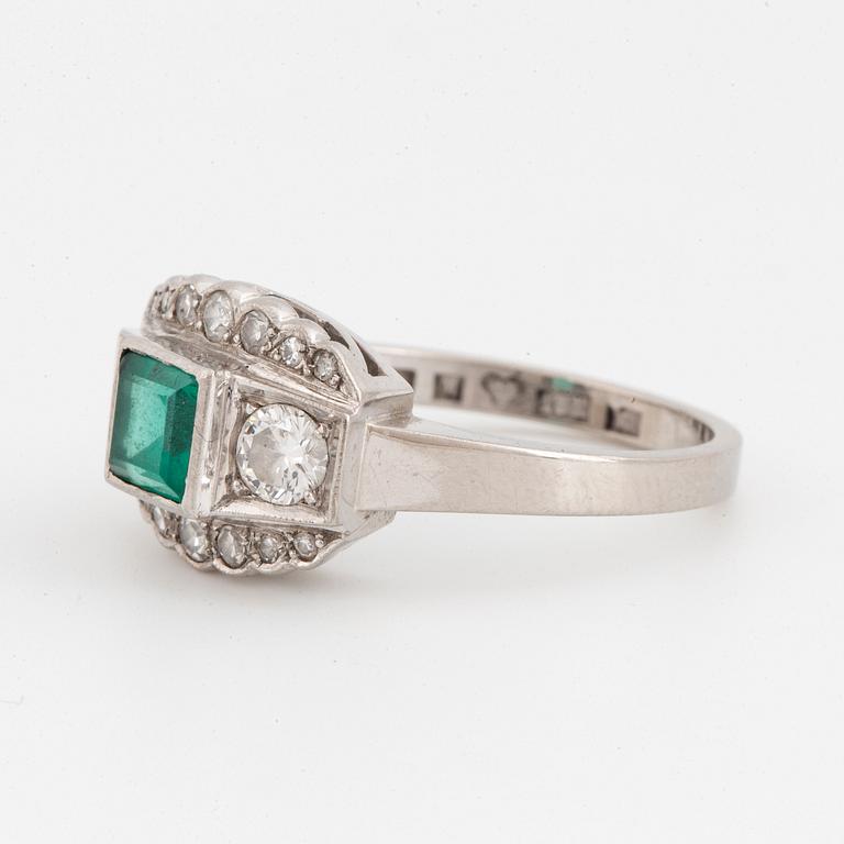 White gold, emerald and  diamond ring.