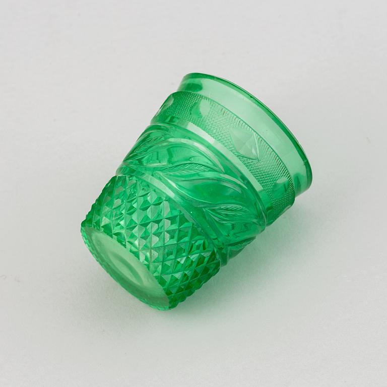 A green tinted cut vodka glass, Russia, Imperial glass manufactory, St Petersburg, 19th Century.