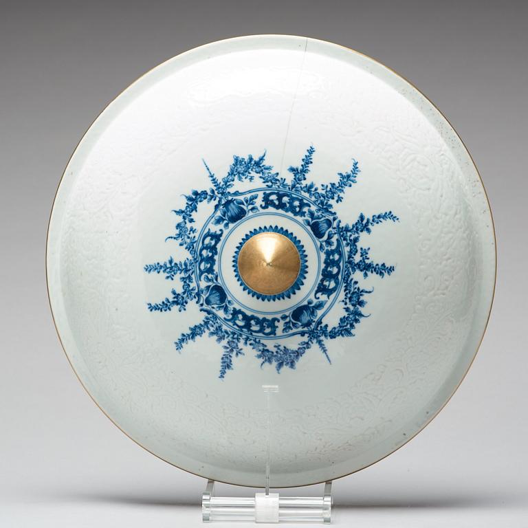 A large blue and white armorial punch bowl with cover, Qing dynasty, Qianlong (1736-95).