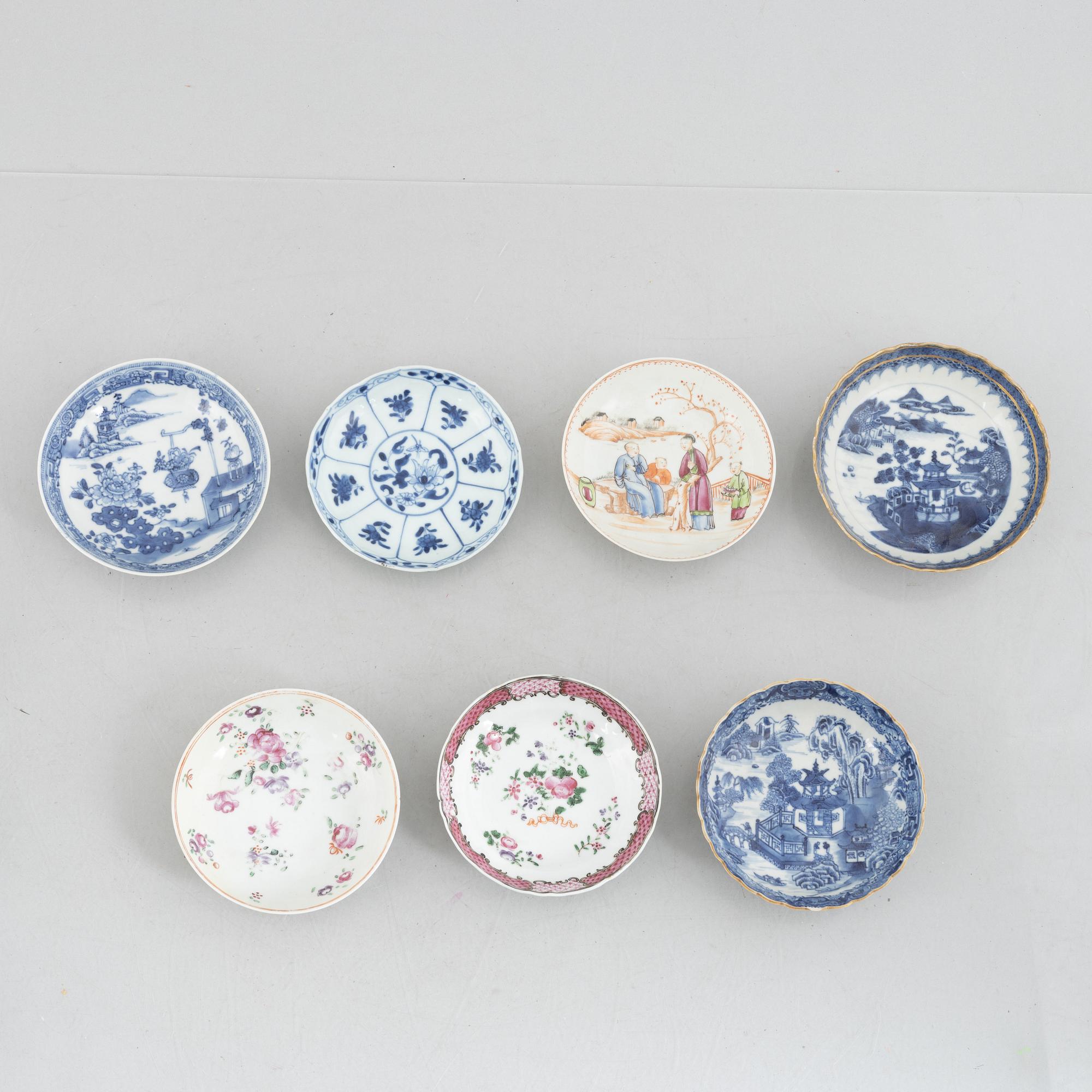 A creamer, seven porcelain cups and seven saucers, China, Qing dynasty, 18th century.