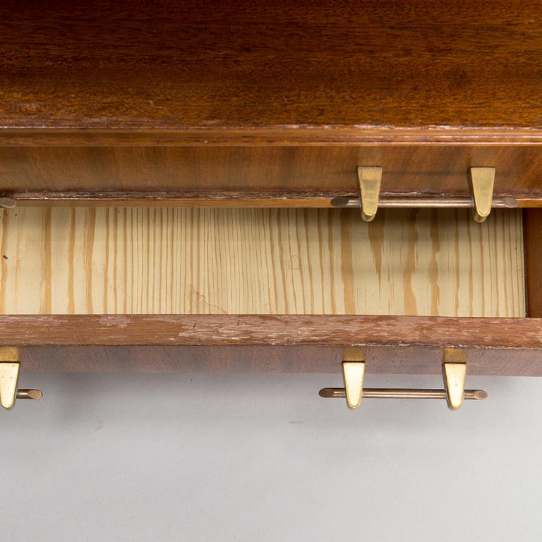 A pair of bed side tables, 1960s-70s.