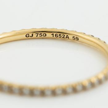 Ringar, Georg Jensen. ett par, "Signature", 18K guld med briljantslipade diamanter.