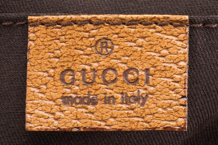 A GUCCI BAG, "STUDDED  BAMBOO HANDLE".