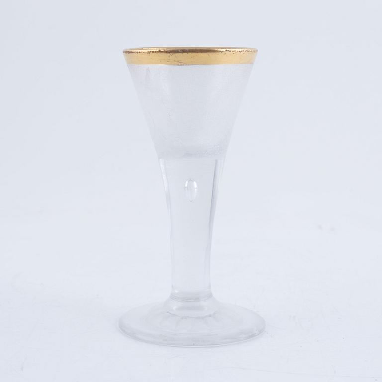 A presumably German engraved and gilt rococo glass, mid 18th century.