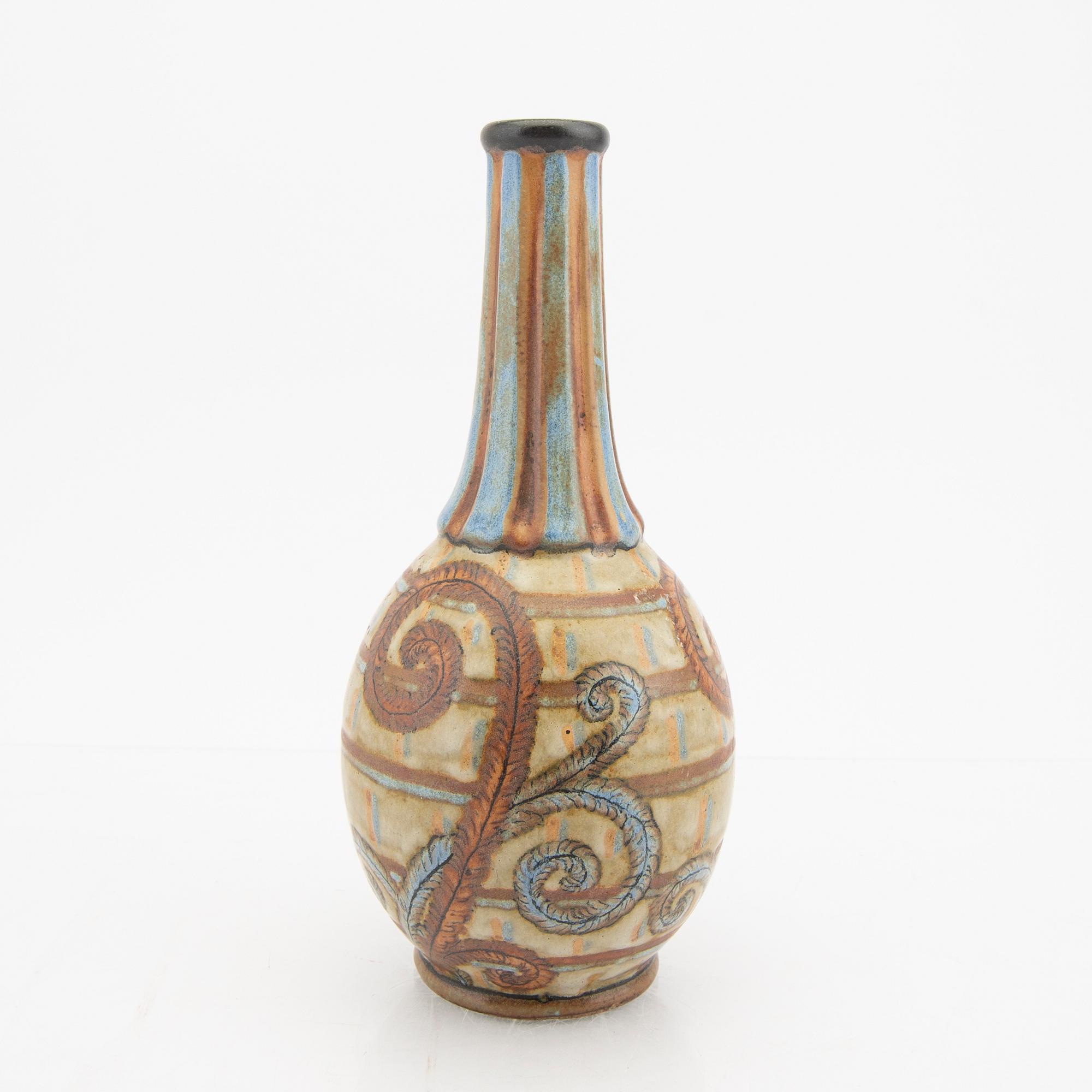 Louis Lourioux, a sig ned ceramic vase.