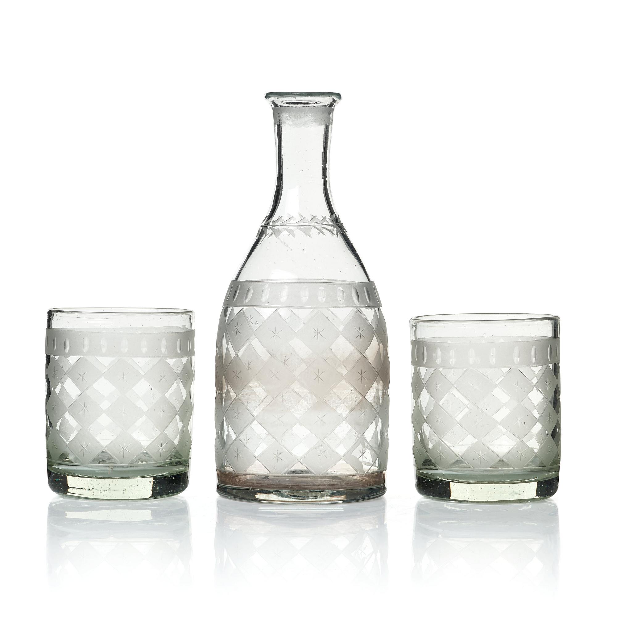 A set of 12 Swedish selter glasses and a bottle, 19th Century.