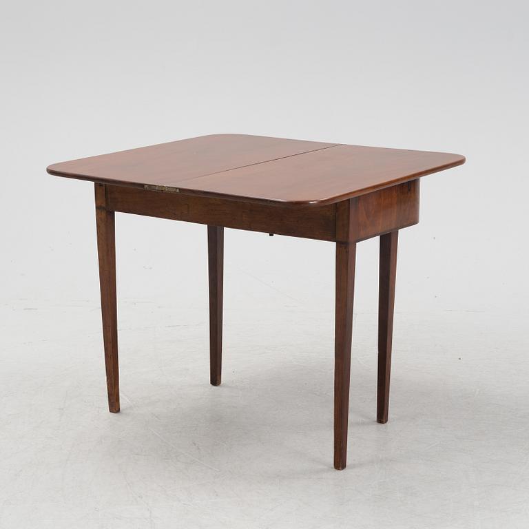 A mahognay card table, early 19th Century.