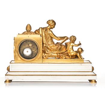 A monumental Louis XVI-style marble and ormolu mantel clock 'à la Geoffrin', first part of the 19th century.