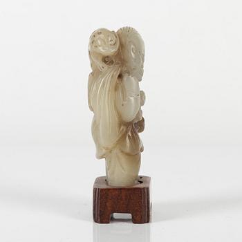 A Chinese stone figure, 20th century.