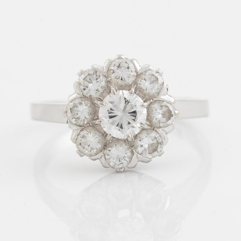 18K gold and brilliant cut diamond cluster ring.