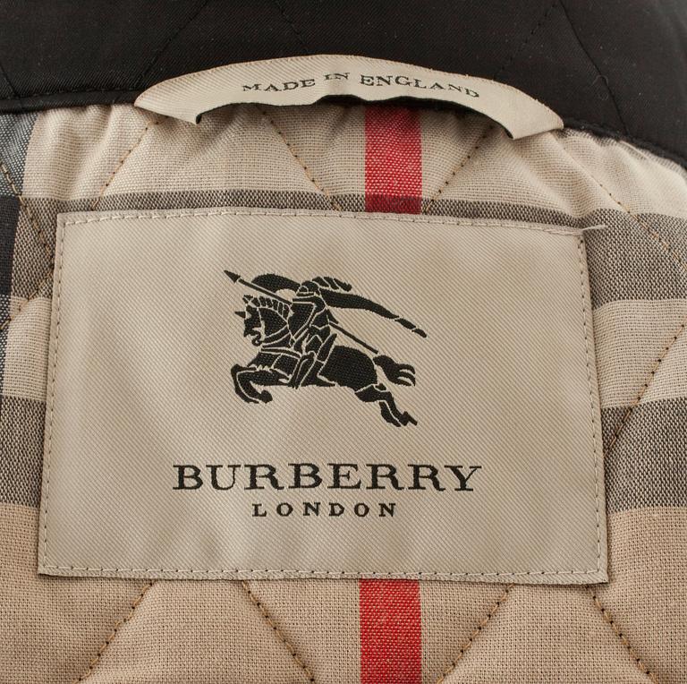BUBERRY, a black quilted short jacket.