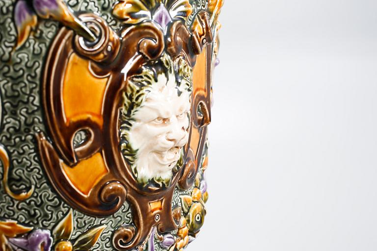 A pot on a pedestal in ceramics made by Rörstrand in the years between 1884-1890.