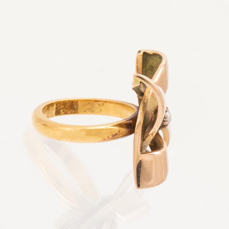 A 23K and 14K gold ring with seed pearl by Nils Berglunds Guldsmedsverkstad Malmo 1946.