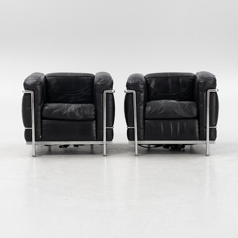 Le Corbusier, Pierre Jeanneret & Charlotte Perriand, a pair of 'LC2' easy chairs, Cassina.