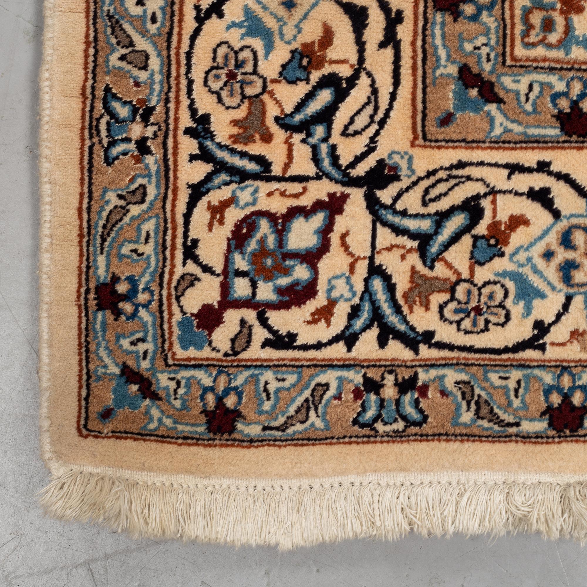 A carpet, Old Nain, part silk, ca 285 x 198 cm.