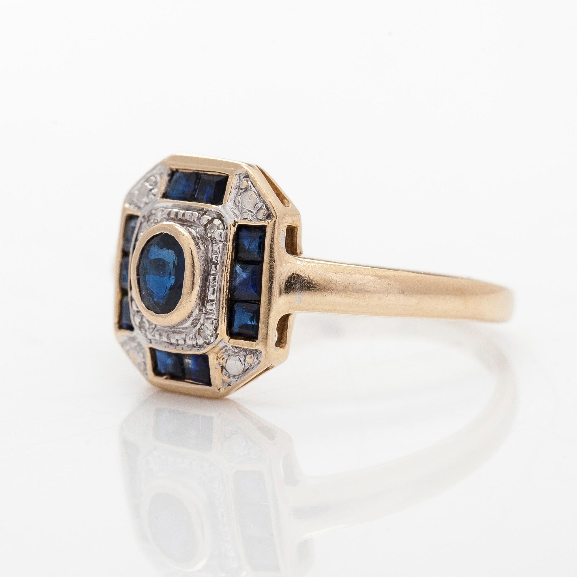 A 14K gold ring with sapphires and eight-cut diamonds. Finnish import marks 1994.