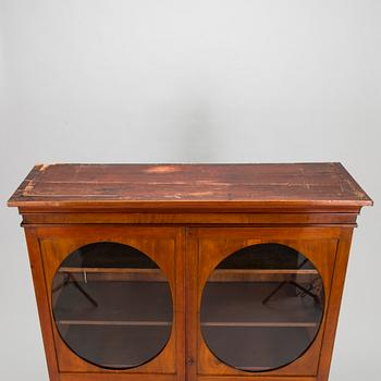 An Empire cabinet, circa 1810.